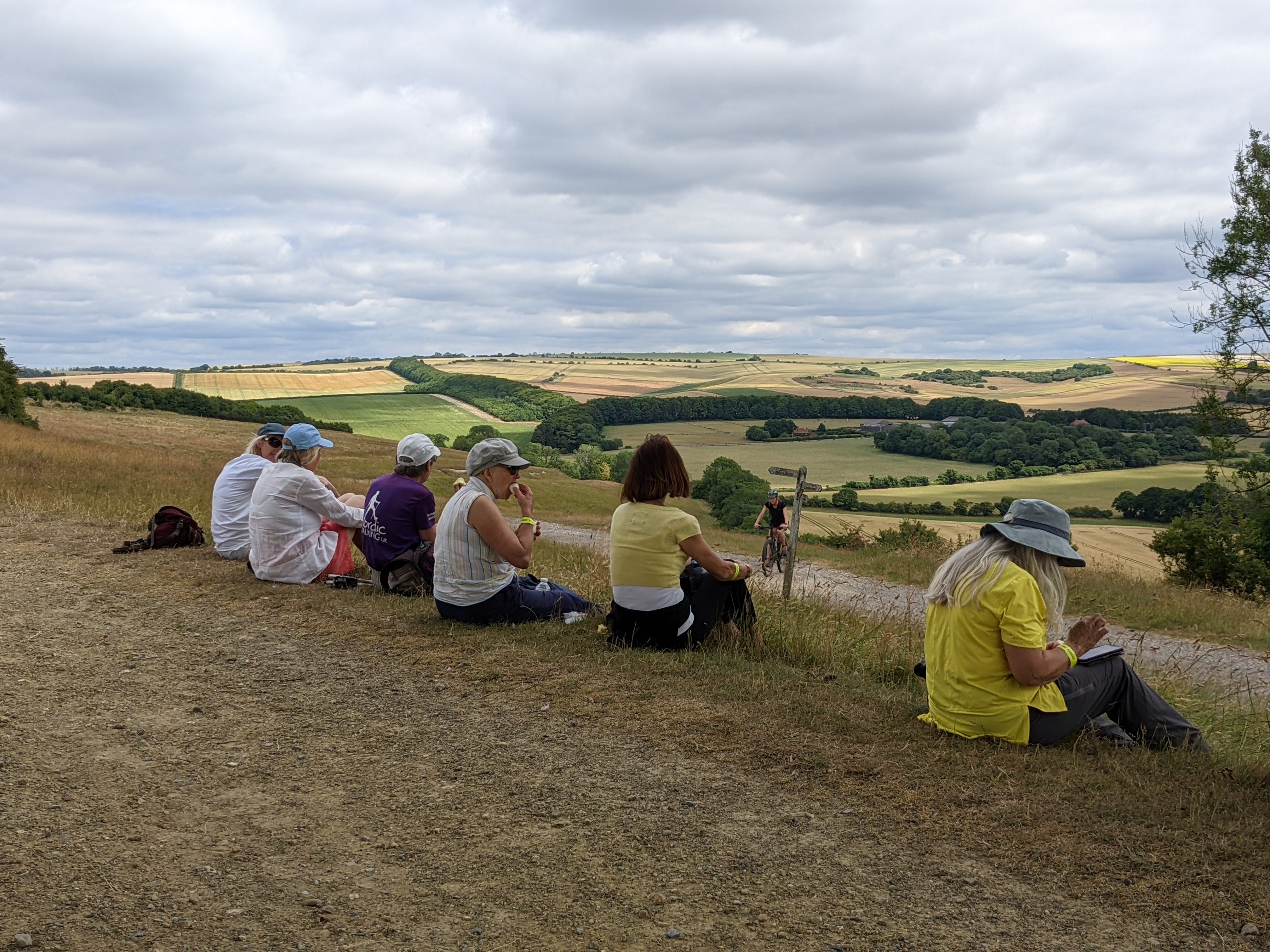 walkers enjoying lunch with a view over the angmering park estate and the cool breeze
