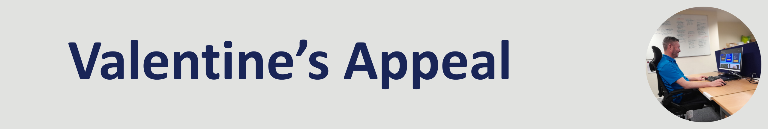 The words Valentines appeal, and a picture of Philip sat at a desk