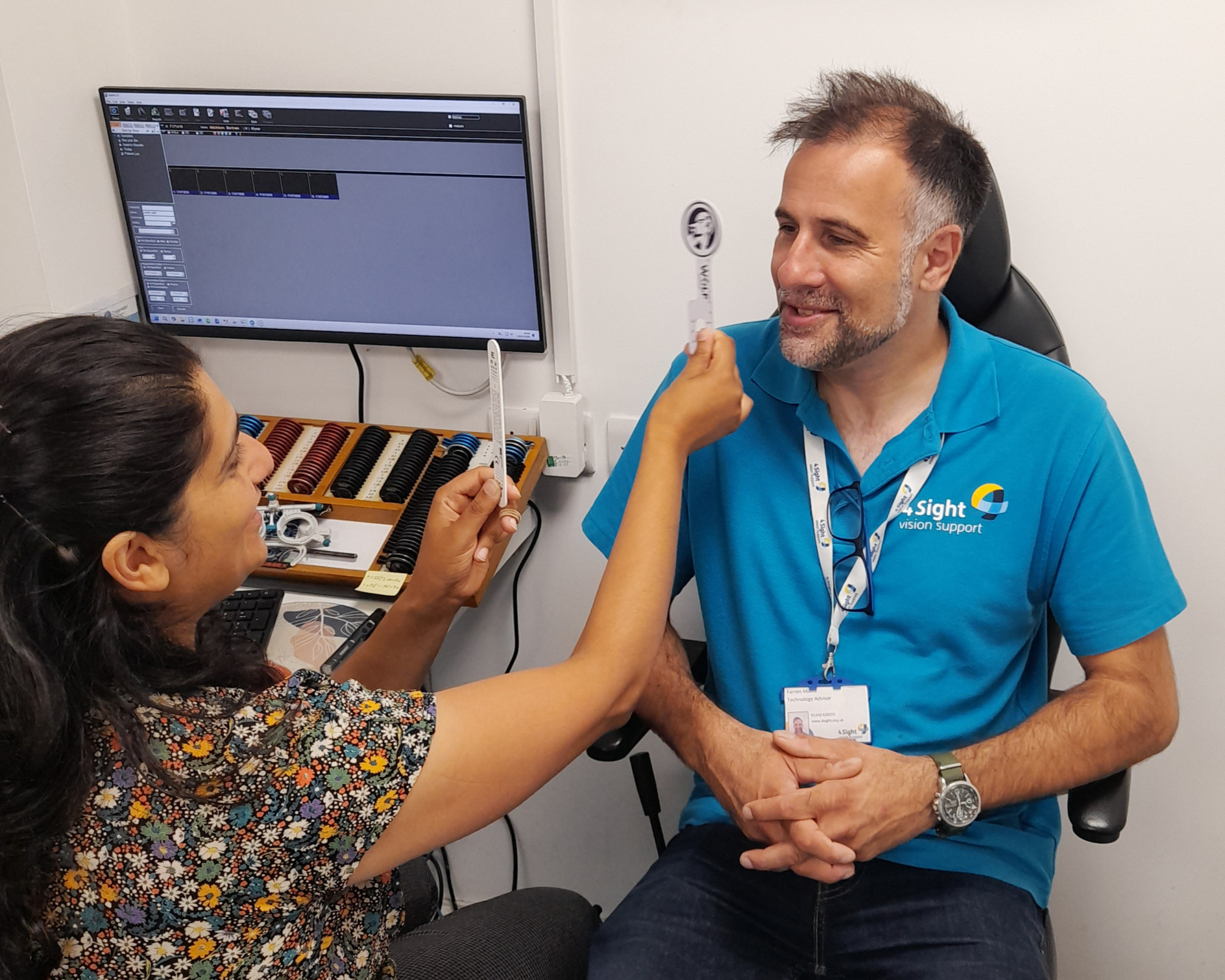 Image: thanks to staff at Walsh & Bridle Opticians & Hearing Care. Optometrist Tanzi undertaking an eye check with 4SVS’s Farren.